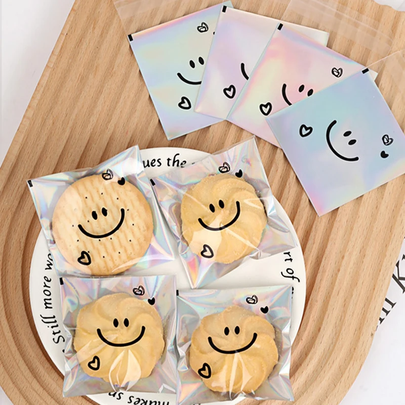 100pcs Cute Smiling Face Self-adhesive Bag Laser Transparent Biscuit Bag Cookie Packaging Bags Birthday Party Baby Shower