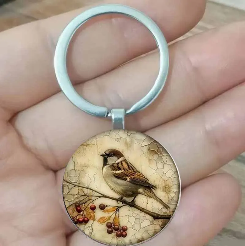 

Vintage Bird and Cherry Keychain - Zinc Alloy, Nostalgic Design, Comes with Detailed Bird Artwork, Perfect for Daily Use, Perfec