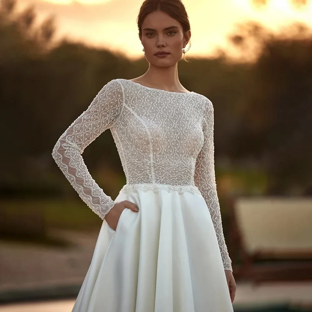 

Customized Hand-made Beads Wedding Dress Illusion Backless Bride Robe Boat Neck Long Bridal Gown Robe De Mariée