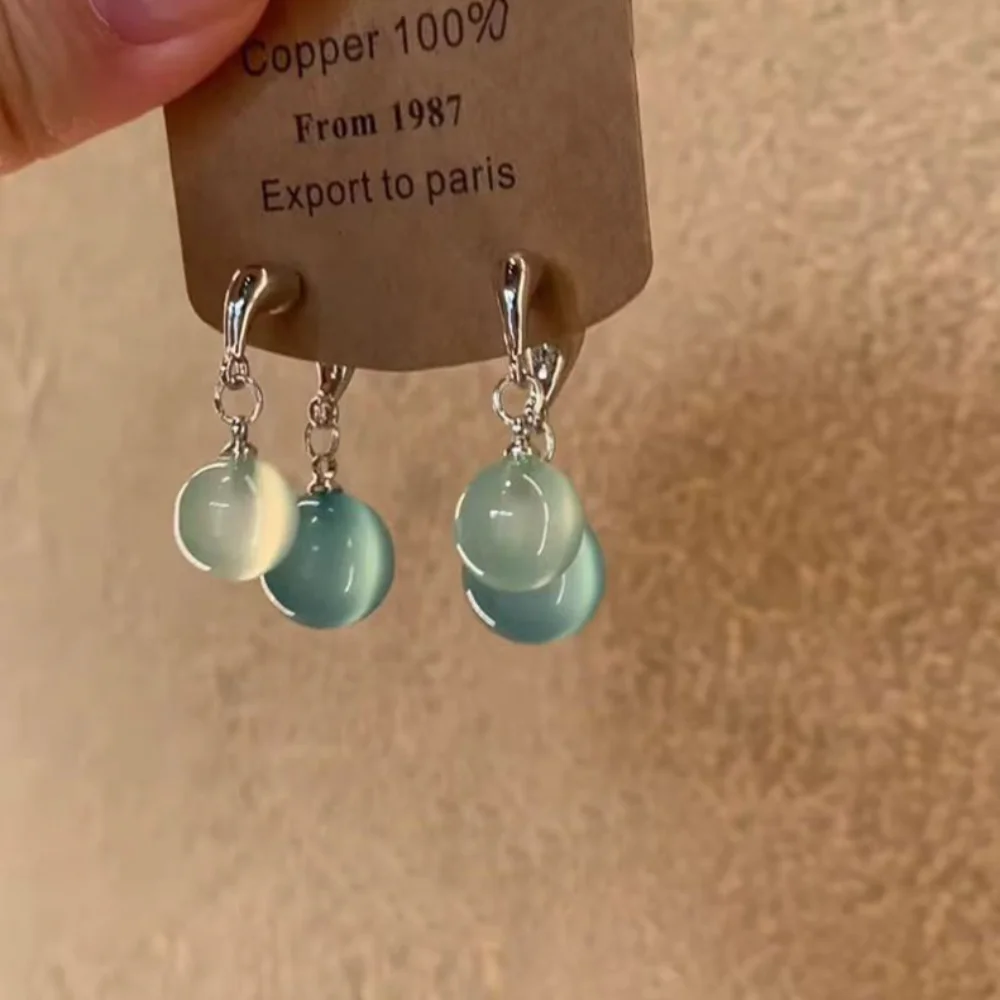 2025 جديد الحلو خمر السيلينيت الفيروز إسقاط أقراط الأبيض زنبق الوادي زهرة أقراط أقراط أنيقة ولطيفة