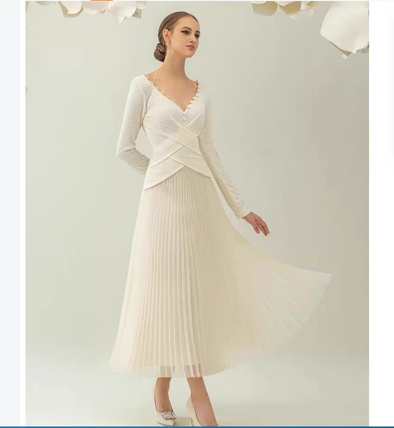 

Autumn temperament V-neck hanging neck cinched waist slimming white pleated dress