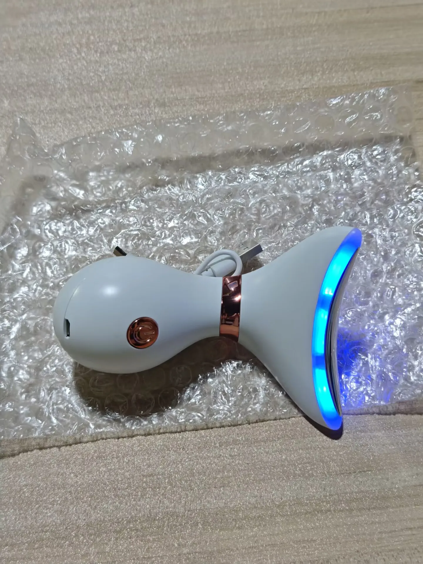 

Professional Skin Tightening Massager with EMS Technology and LED Light Therapy for Youthful Glow
