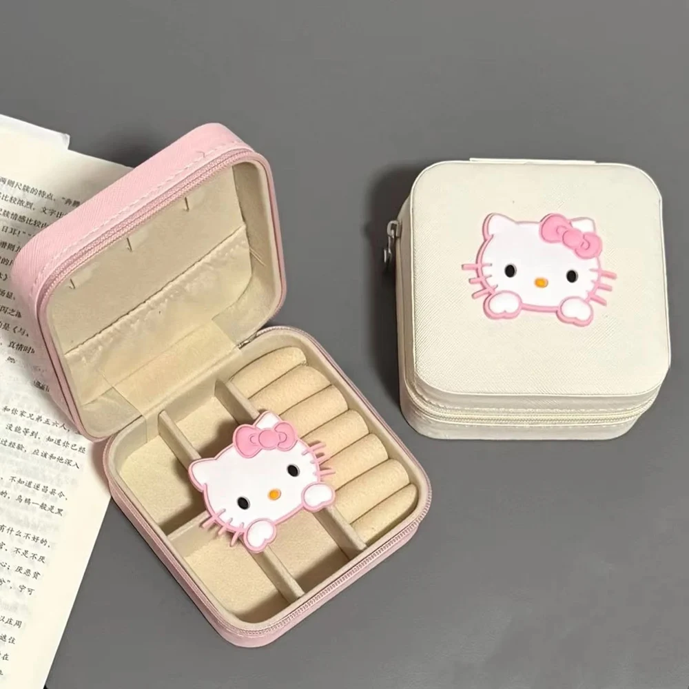 กล่องใส่เครื่องประดับแมวน่ารักสีชมพู Sanrio รุ่นใหม่ ขายดี พกพาสะดวก กล่องเก็บแหวน ต่างหู กล่องเก็บอุปกรณ์เสริมขนาดเล็กพกพาสำหรับเดินทาง