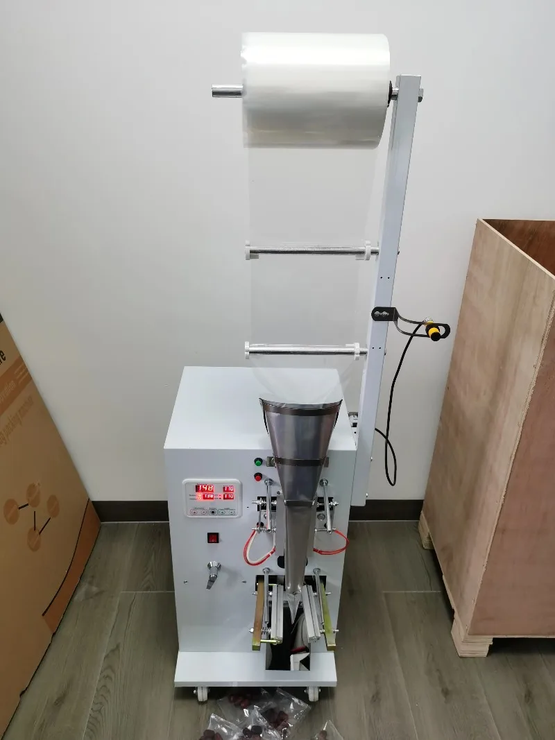 

manual feeding and packaging machine sealing machine granules food medicinal herbs tea bags Three-side sealing package machine