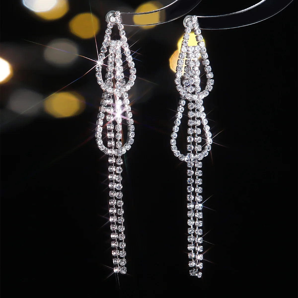 Accessories: Fashionable versatile sparkling rhinestone earrings, elegant and luxurious Korean style earrings for women. Source
