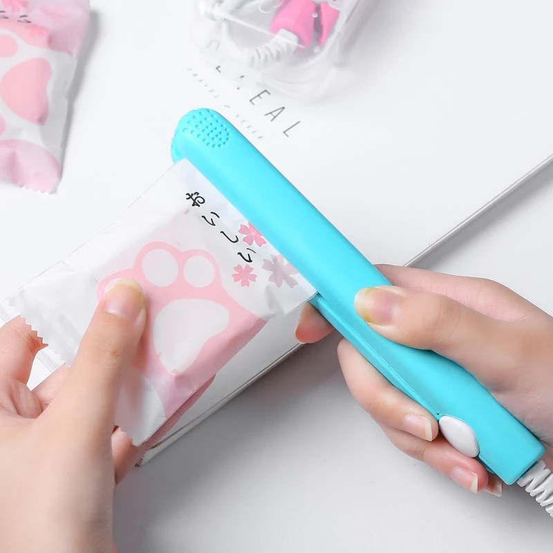 maquina-de-selagem-de-snacks-em-forma-de-floco-de-neve-para-uso-domestico-tipo-manual-seladora-de-plastico-para-embalagens