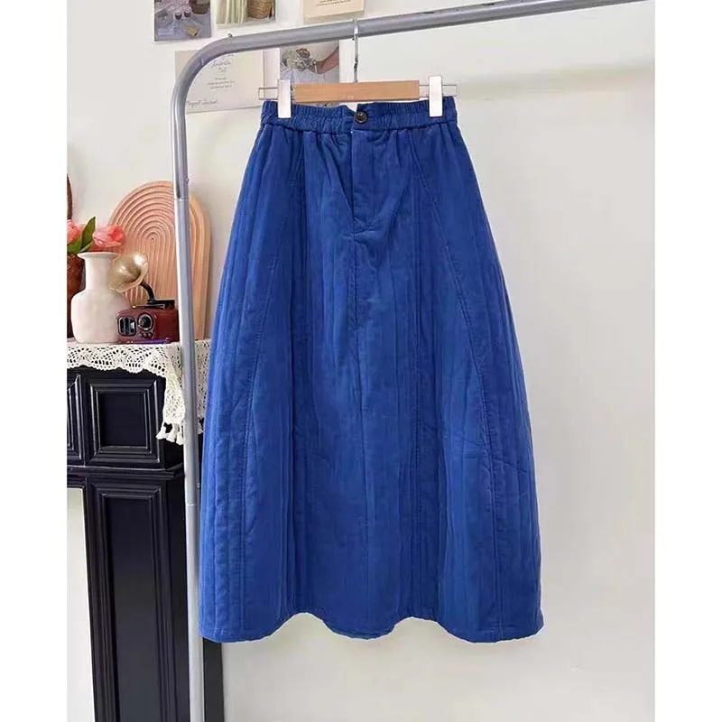2026 new corduroy quilted skirt daily necessities wind thick warm skirt in autumn and winter literary temperament long skirt