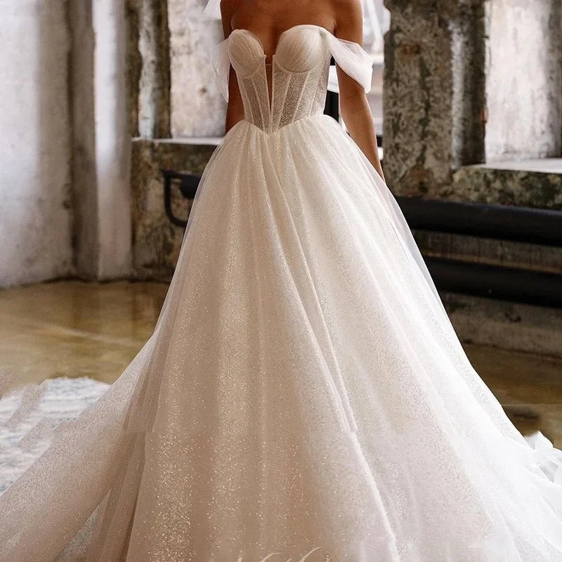 Maßgeschneiderte, glänzende, schicke Brautkleider aus Organza mit Stickerei, Pailletten, A-Linie, Braut-Boot-Ausschnitt, ärmellose Robe De Mariee