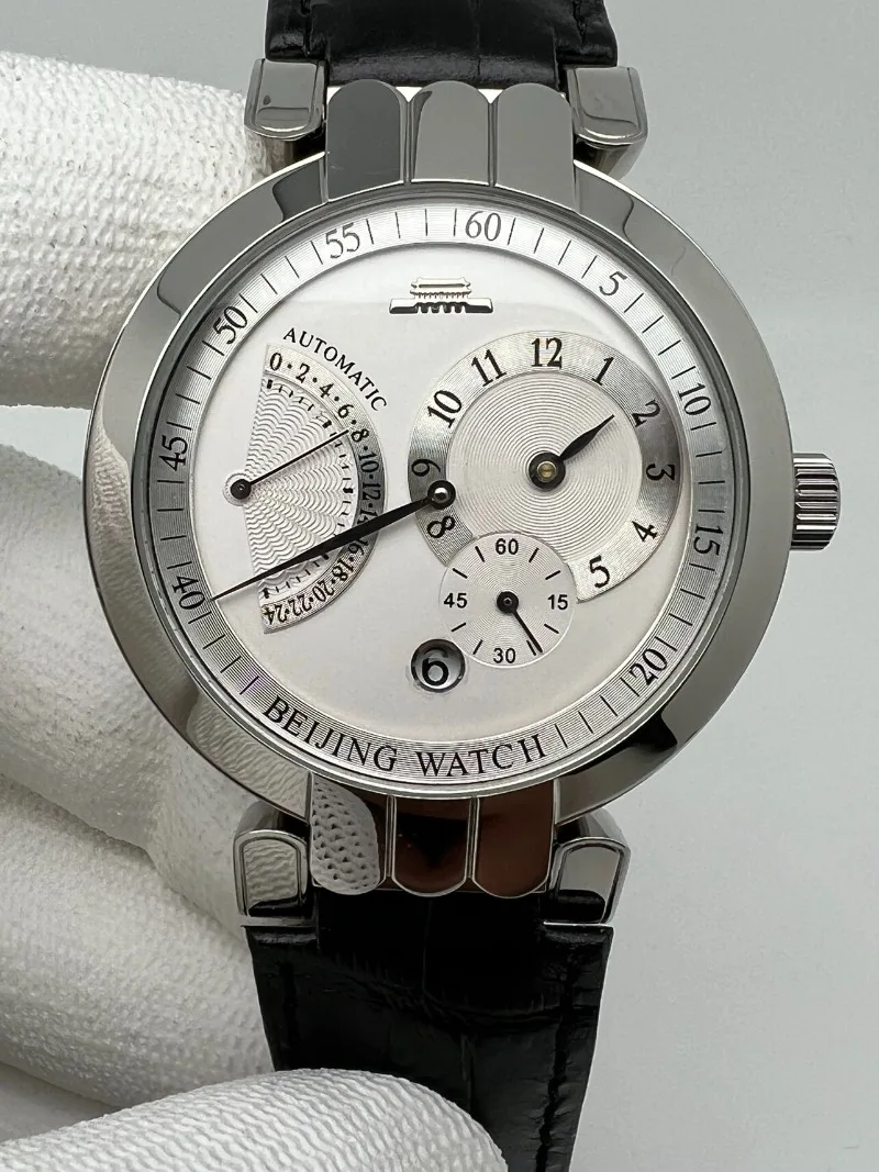 

Часы Beijing Watch серии Silver Bridge с белым циферблатом, многофункциональные, полностью автоматические, механические.