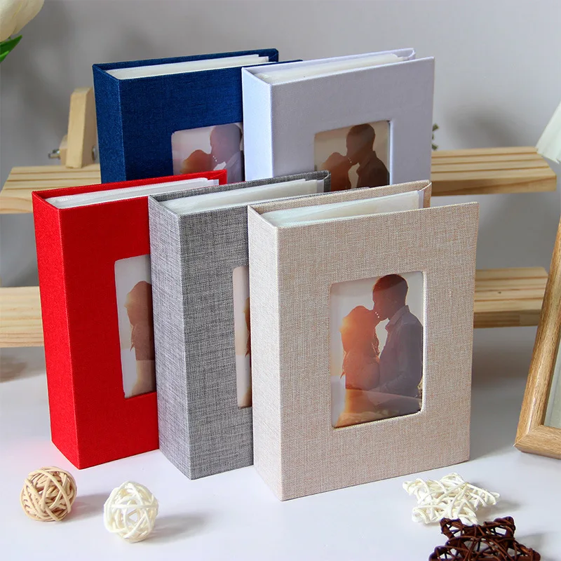 1 album photo avec couverture en lin de 6 pouces, 50 pages qui peuvent contenir 100 photos, adapté aux mariages, anniversaires, œuvres d'art ou cartes postales.。