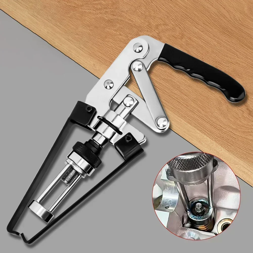 

Metal Valve Spring Compressor with Cam Action and Reversible Jaw Adaptor for Removing Valve Keepers in Various Engines