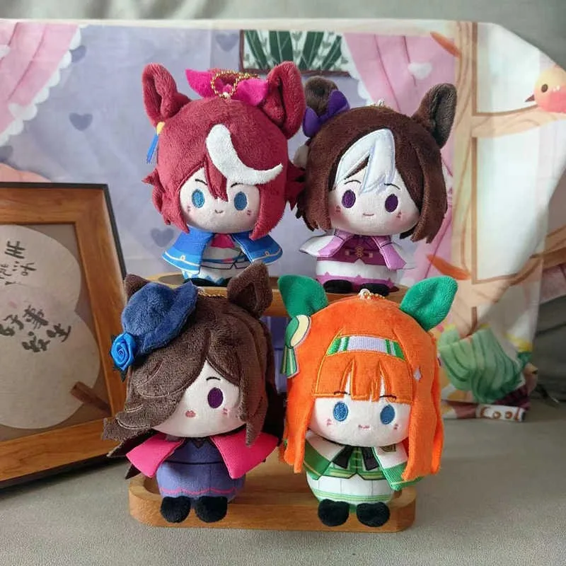 Uma Musume joli Derby Tokai Teio semaine spéciale assis Pose poupées Silence Suzuka douche de riz porte-clés en peluche poupée en peluche pendentif