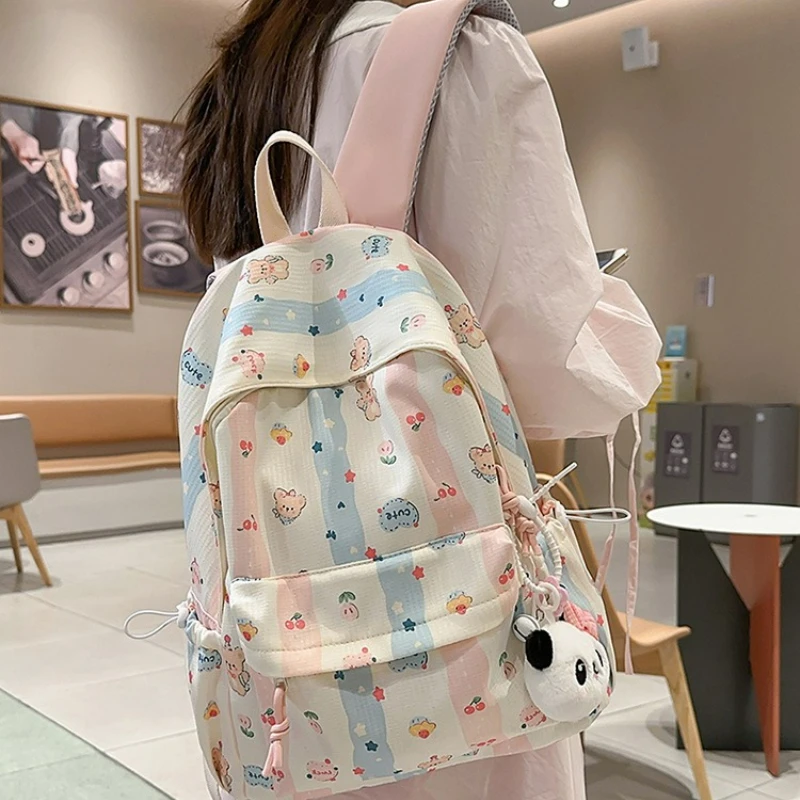 جديد لطيف الكرتون على ظهره المرأة سعة كبيرة حقيبة مدرسية موضة طباعة حقائب الظهر مريحة ومتعددة الاستخدامات الملمس حقيبة المدرب