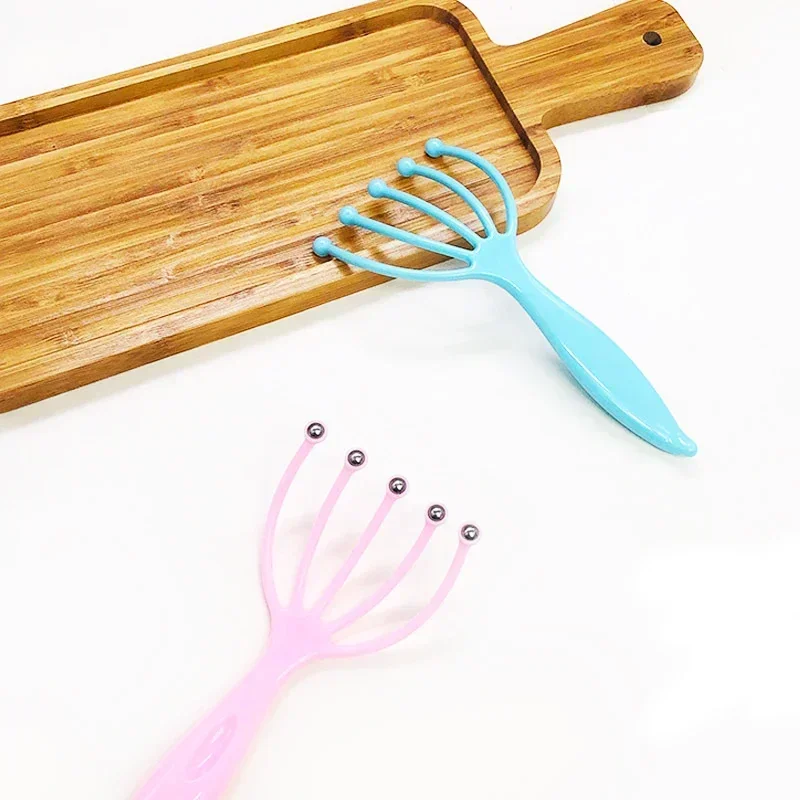 

Мягкий ручной массажер для головы и шеи, ролик-гребень с пятью стальными зубцами, для расслабления, SPA-ухода за волосами и снятия напряжения с головы