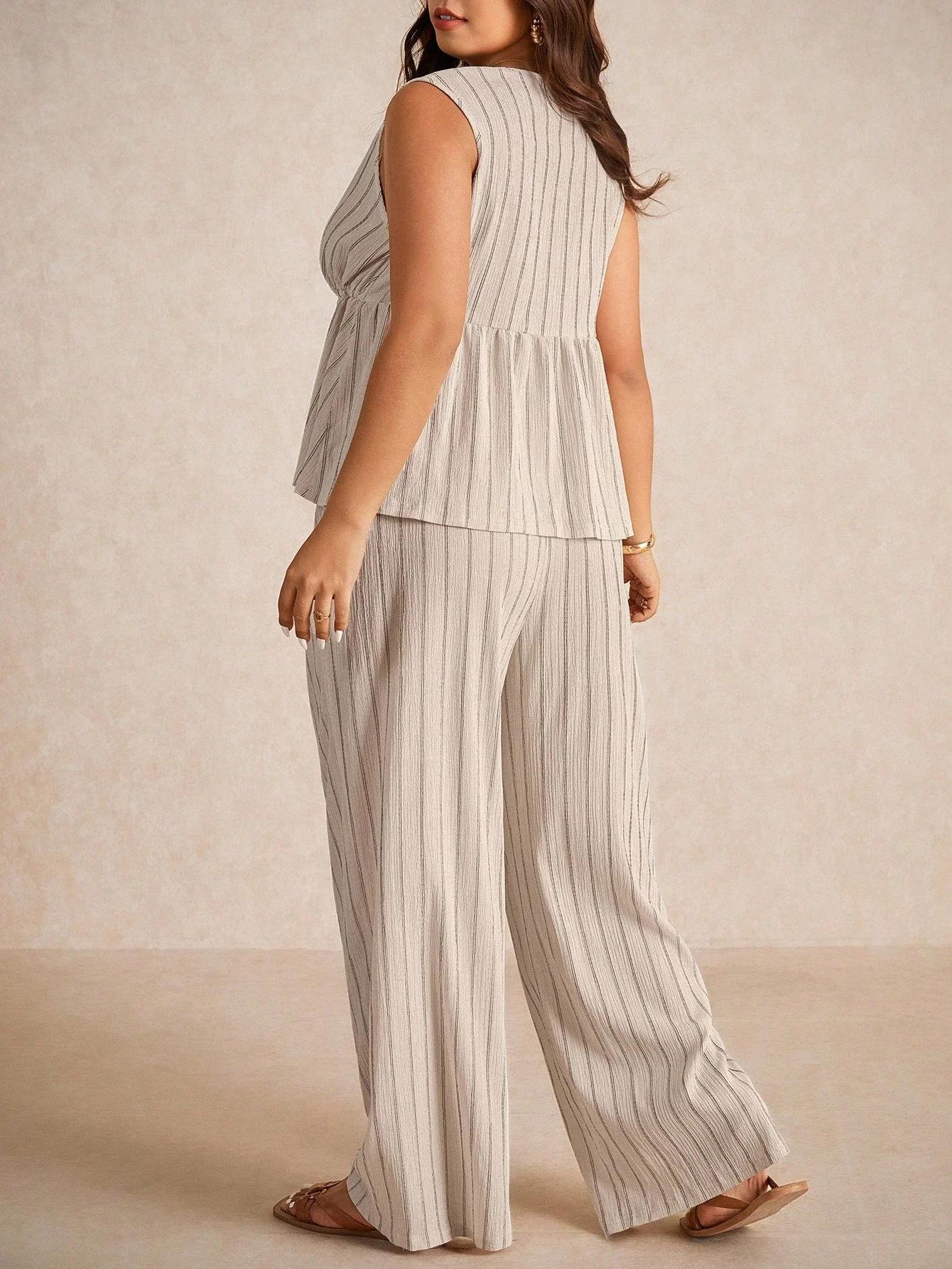 

Plus Size Casual Vacation Striped Sleeveless Peplum Top And Wide Leg Pants 2 Piece Set
