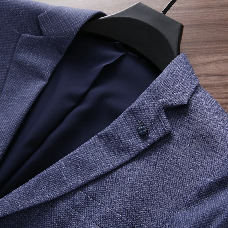 بدلة رجالية كاجوال بقصة ضيقة باللون الأزرق الفاتح من Busin Jaet موسم الربيع قابلة للتناول بصدر واحد وزرين طويلة Sve