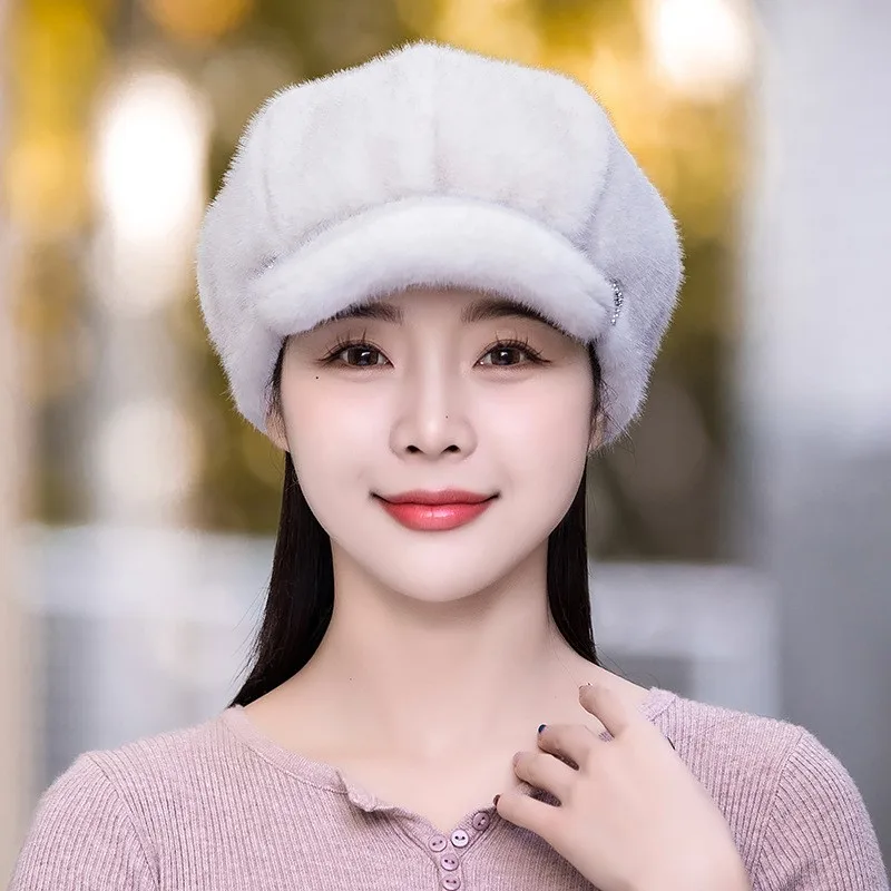 The new hats are fashionable and versatile for women in winter plush beret keeps you warm protects your ears