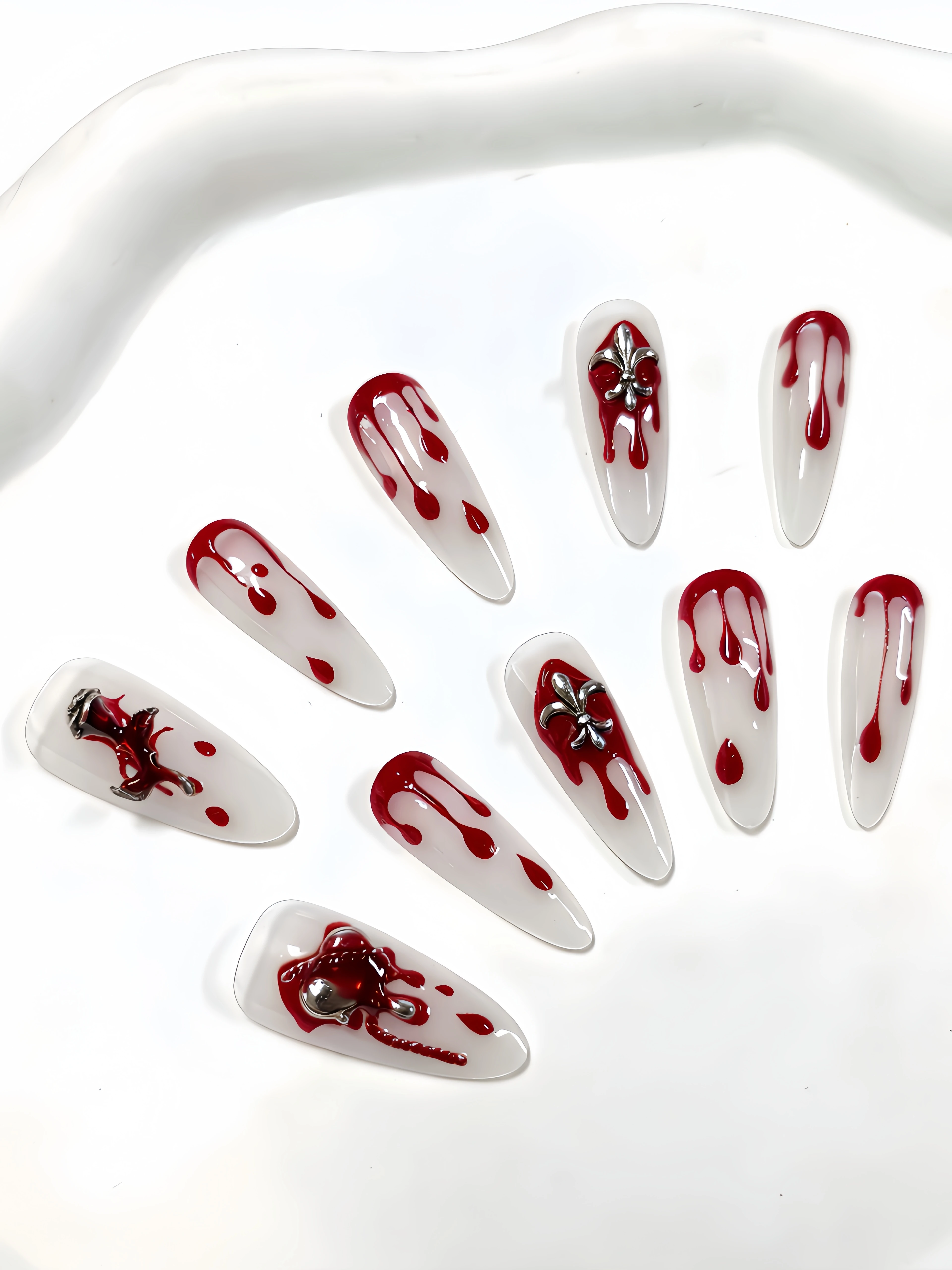 10 Long Waterdrop-Shaped Press-On Nails, with a Milky White Base Color Paired with Red Waterdrop Metal Chain Flower Decorations and Rhinestone Elements, Simple and Stylish Nail Art Patches for Y2K Gothic Style Enthusiasts, Suitable for Daily Use, Work, Office, Bars, Clubbing, Music Festivals, Etc., Punk Style Fake Nails, Suitable for Parties, Swimming, Summer Dates, and Punk Style Nail Art. Includes One Jelly Glue and One Nail File view 4