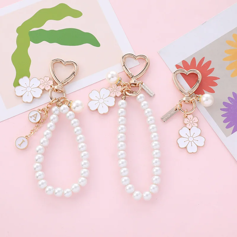 Enamel Flower Imitation Pearl Keychain for Women Fashion Sweet Letter Heart Key Buckle Handbag Earphone Case Decoration Jewelry