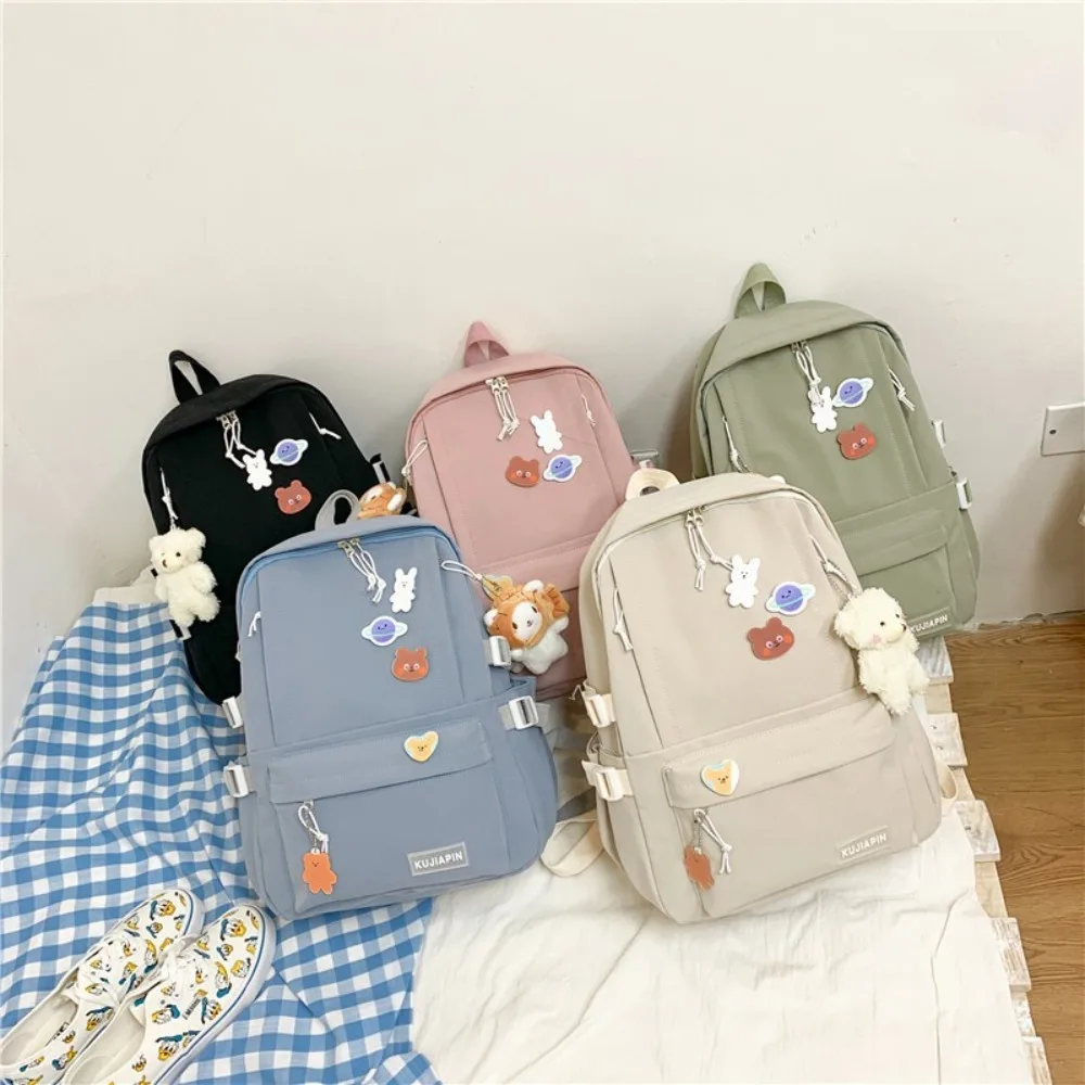 

Trendy Nylon Large Capacity Bags Simple Canvas Badge Shoulder Backpack Schoolbag with Pendant Korean Style School Bag Kids