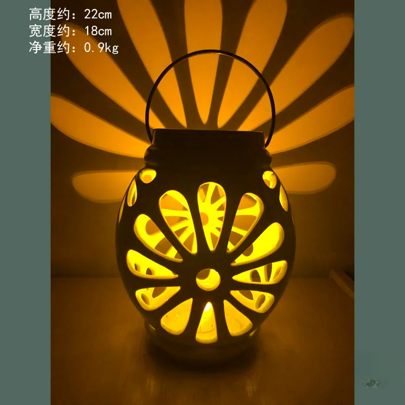 Cracked ceramic material, emerald green hollowed out sunflower pattern, handle wind light ornament