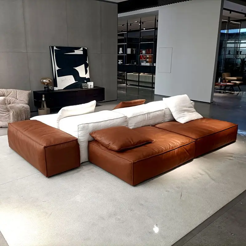 Sofá minimalista italiano de doble cara, horizontal, de cuero, tipo módulo, estilo bloque de tofu, para vestíbulo de hotel, con un toque de alta gama.