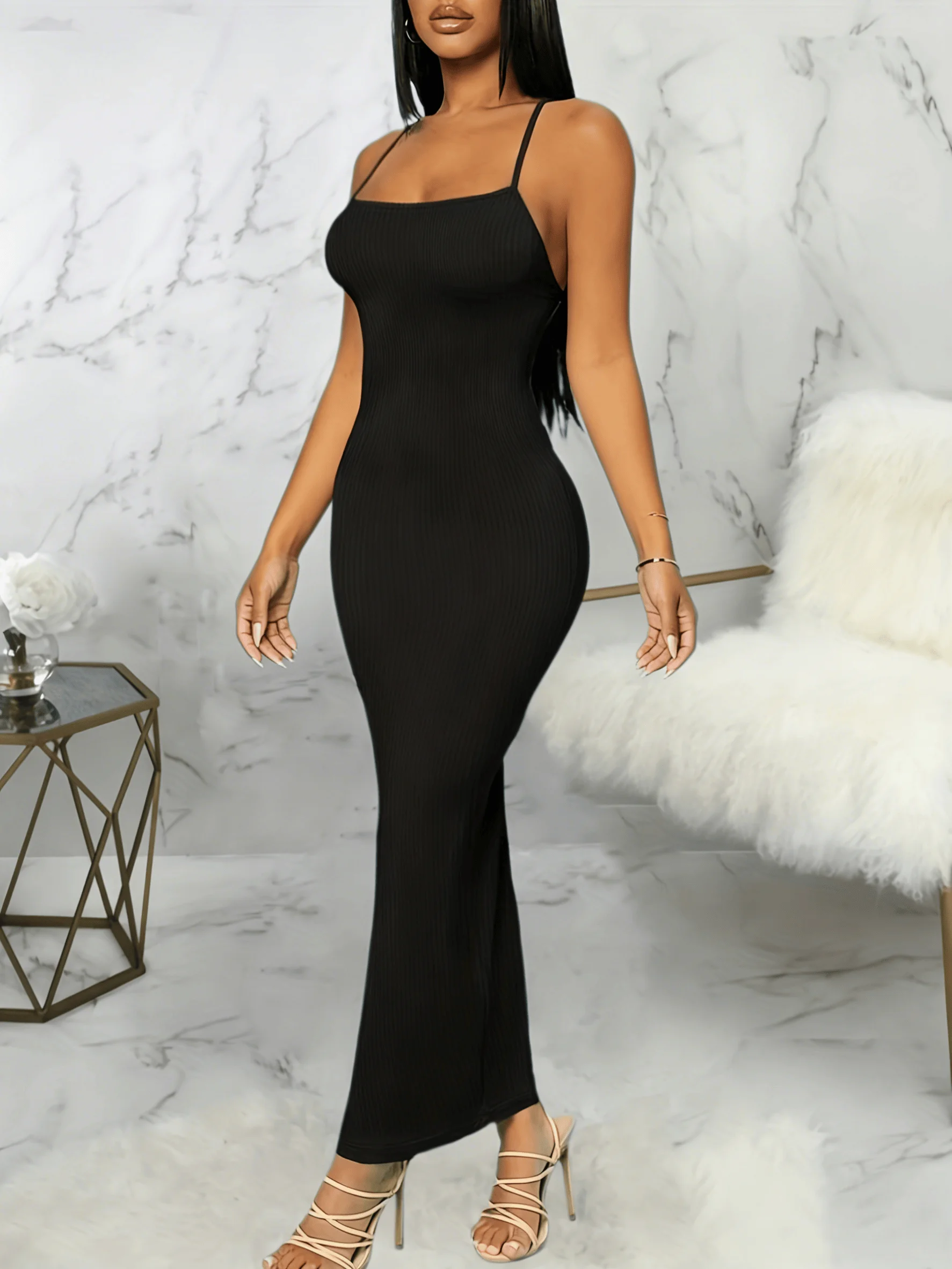 Vestido negro Sexy de estilo europeo y americano con tirantes finos para mujer, falda larga ajustada, vacaciones en la playa para primavera y verano