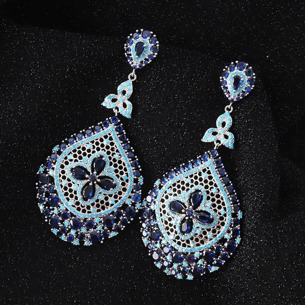 

Luxury Blue Protein Stone Heavy Industry Earrings Fashion Design High-end Micro-inlaid Zircon Temperament Hollow Earrings Girls