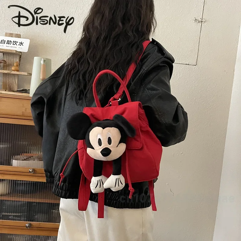 Mickey 2024กระเป๋าเป้แฟชั่นผู้หญิงใหม่, กระเป๋าเป้สะพายหลังตุ๊กตา3D คุณภาพสูงอเนกประสงค์สีทึบจุของได้มาก