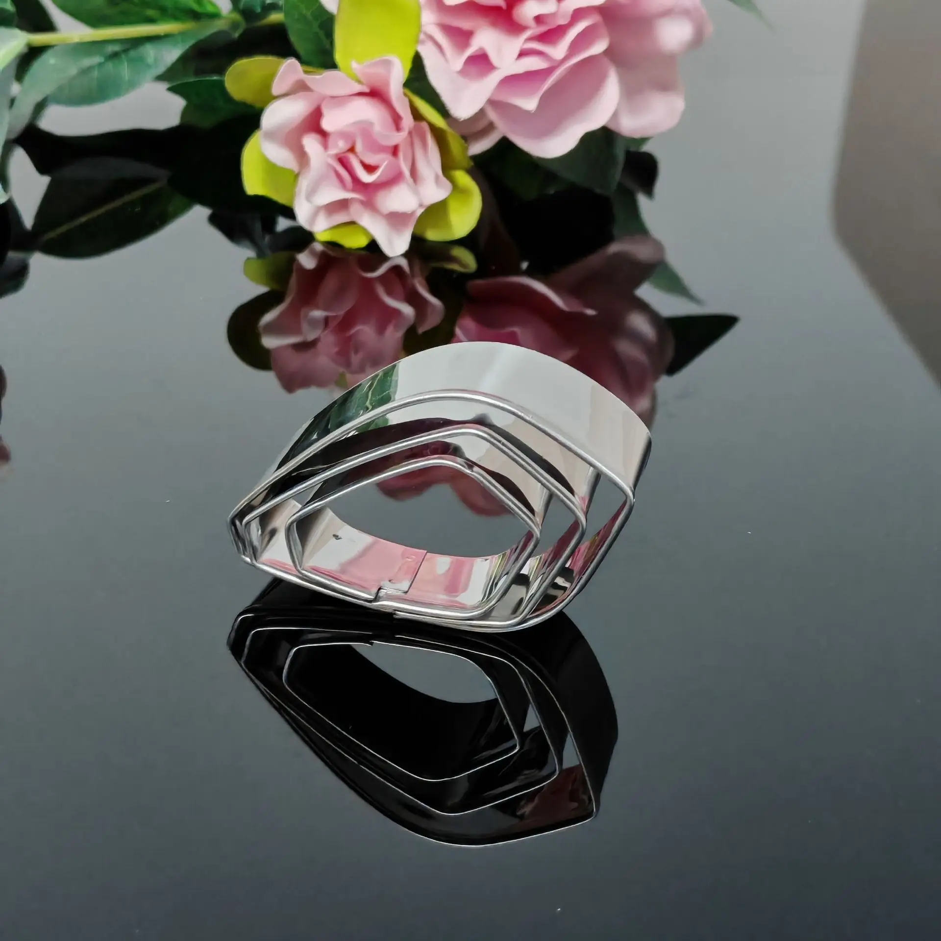 Food-safe stainless steel floral cutter set featuring gardenia-shaped petal templates for cake decorating and dessert crafting —
