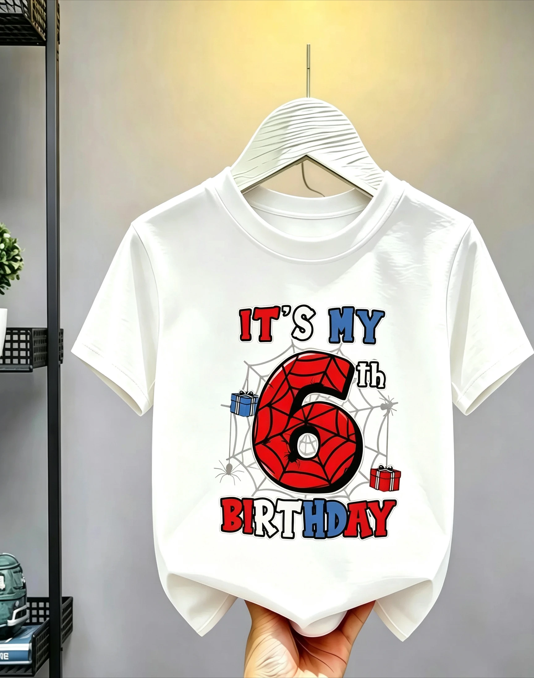 Cotton short-sleeve T-shirt with spider web hero print, great for boys and girls aged 1‑10 for birthdays or everyday wear