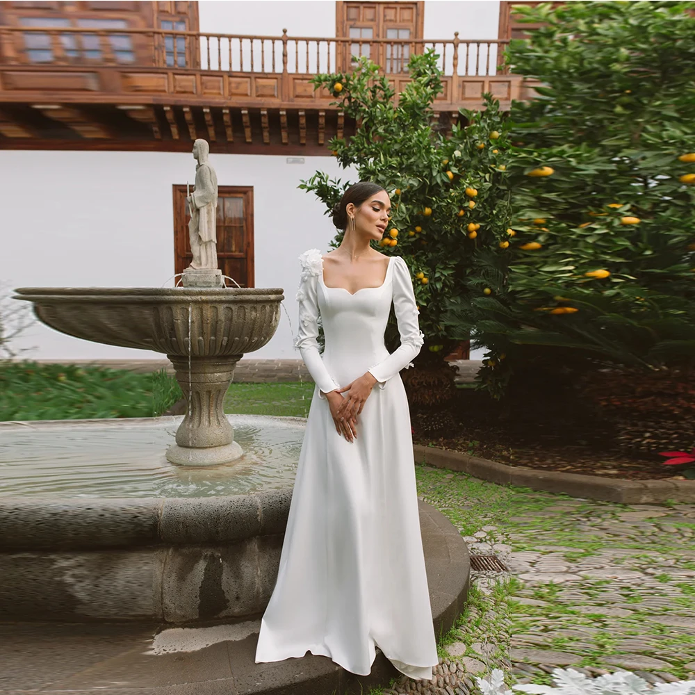 فساتين زفاف نسائية مخصصة موديل 2025 برقبة مربعة وأكمام طويلة أنيقة من الساتان فساتين العروس بطول التطهير رداء الولائم