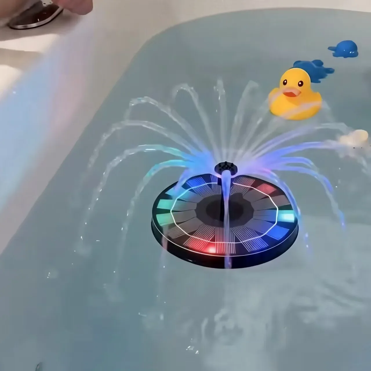 Mini solar-powered fountain water feature with colorful fountain lights, pool, and floating fountain pump