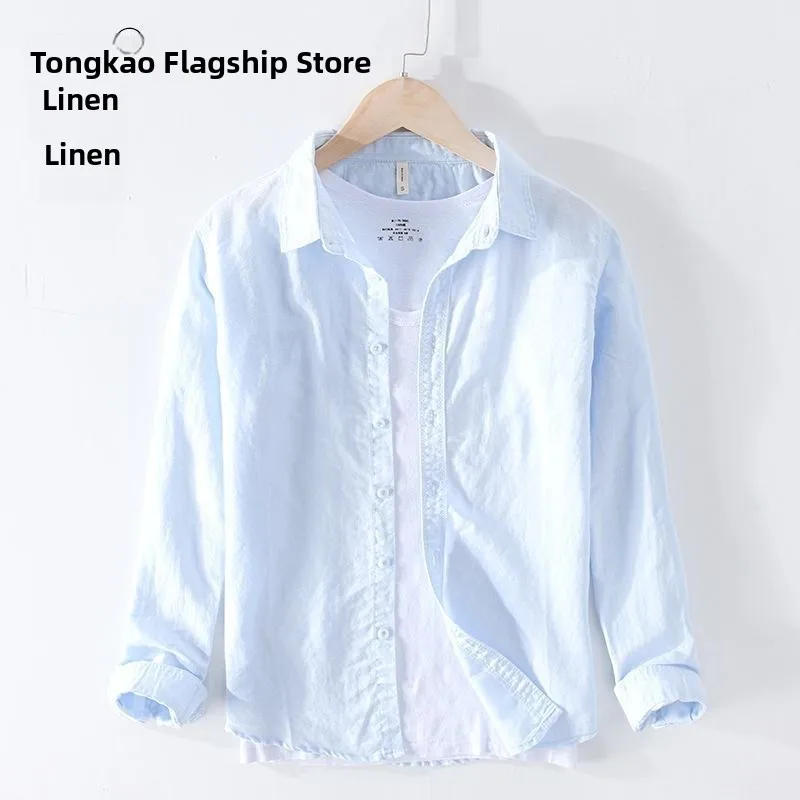 قميص رجالي جديد فضفاض بأكمام طويلة من القطن والكتان، تصميم فني عصري مريح وقابل للتنفس، أسلوب حضري للربيع والخريف بلون موحد