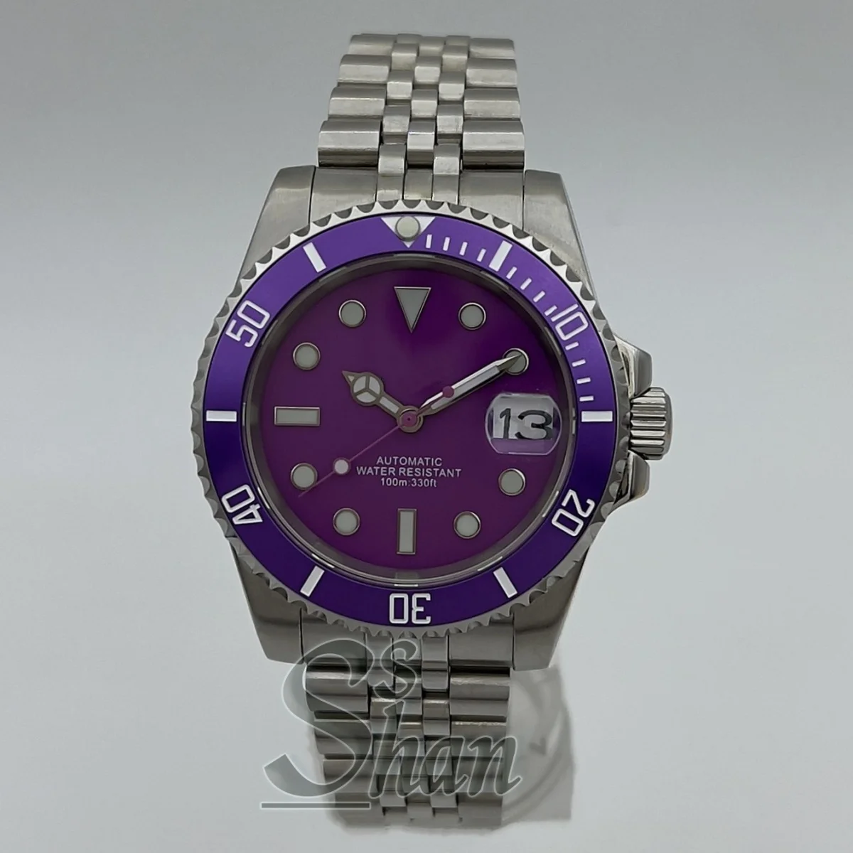 

40mm men's automatic diving watch NH35 stainless steel strap features a sapphire glass unidirectional rotating purple dial bezel
