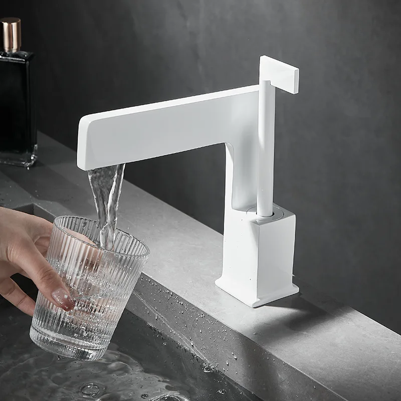 Creative white all copper washbasin faucet, bathroom hot and cold water waterfall style splash proof water outlet