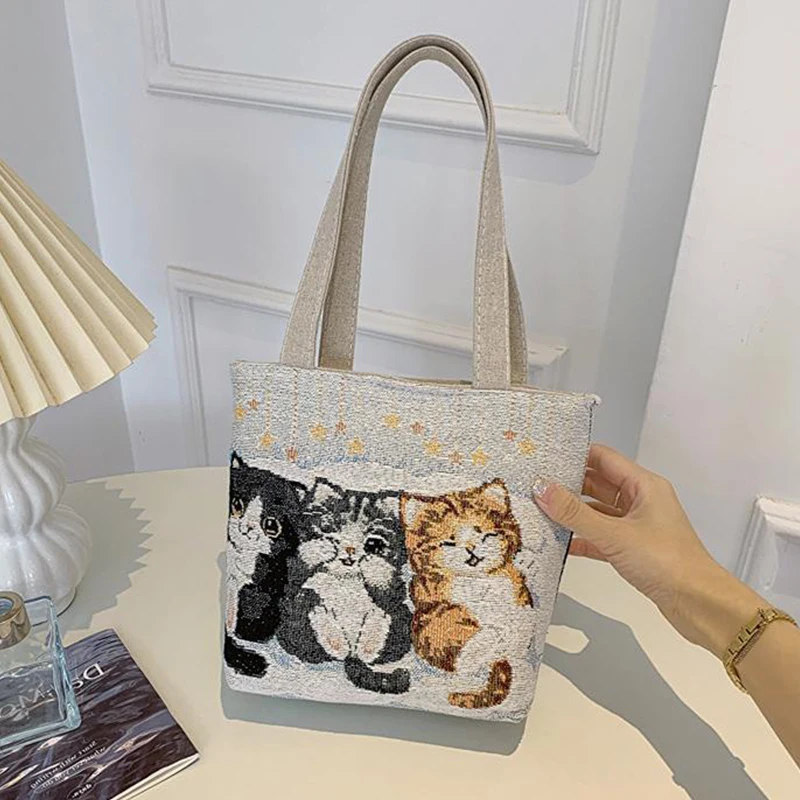 Borsa da donna portatile ricamata con filo d'oro con motivo a doppia faccia di nuova moda