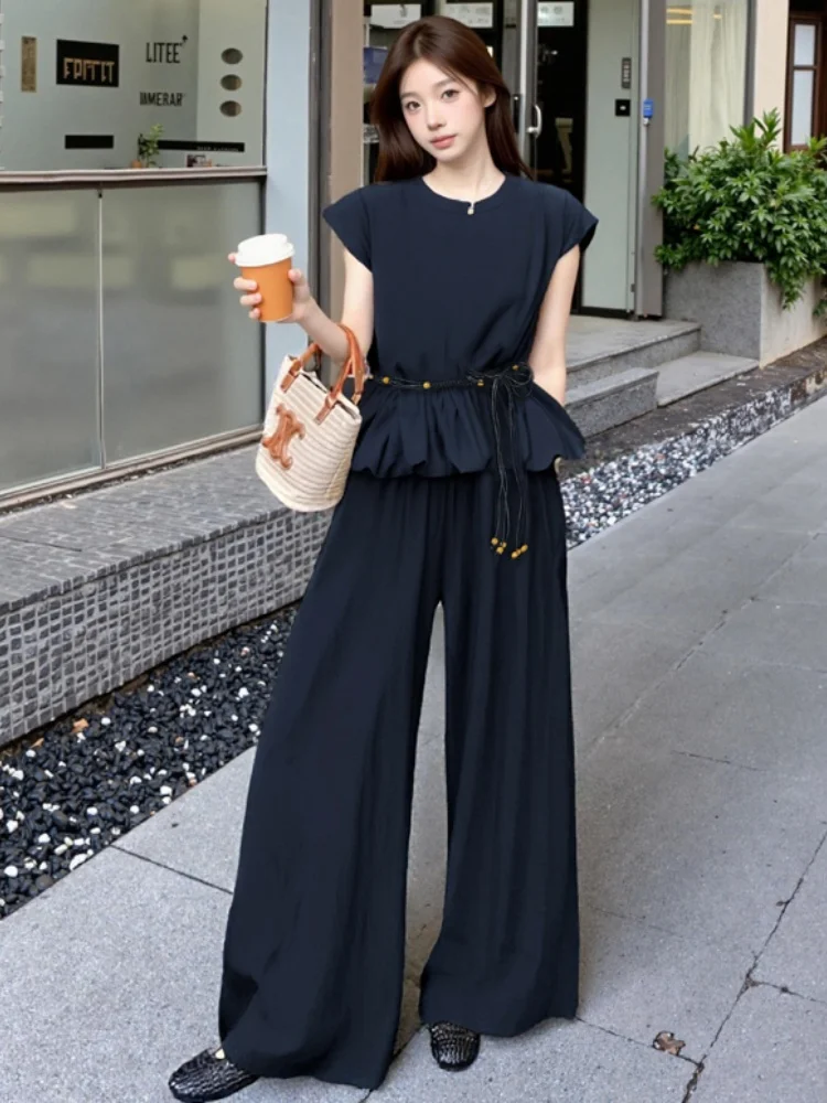 

Новый модный повседневный льняной топ с круглым вырезом и короткими рукавами, комплект из двух предметов для женщин, лето 2025 г., широкие брюки с высокой талией, комплект из 2 предметов