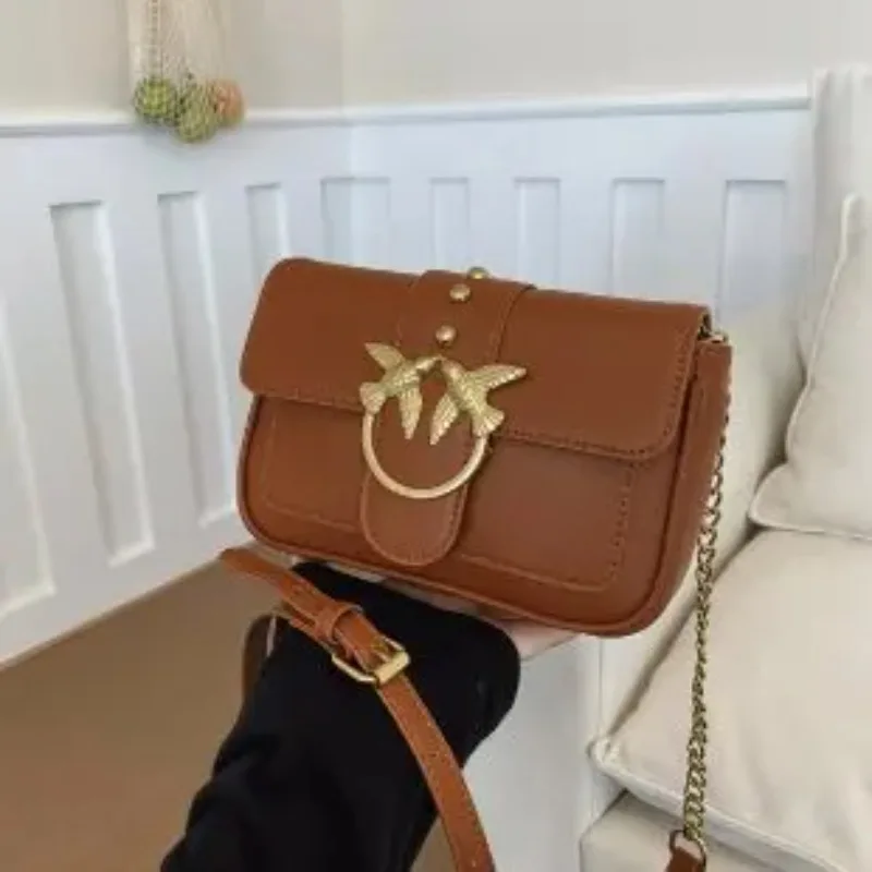 A New, Fashionable, Unique and Luxurious Brand Designed Women's Bag Featuring Elegant and Classic Style of Swallows.