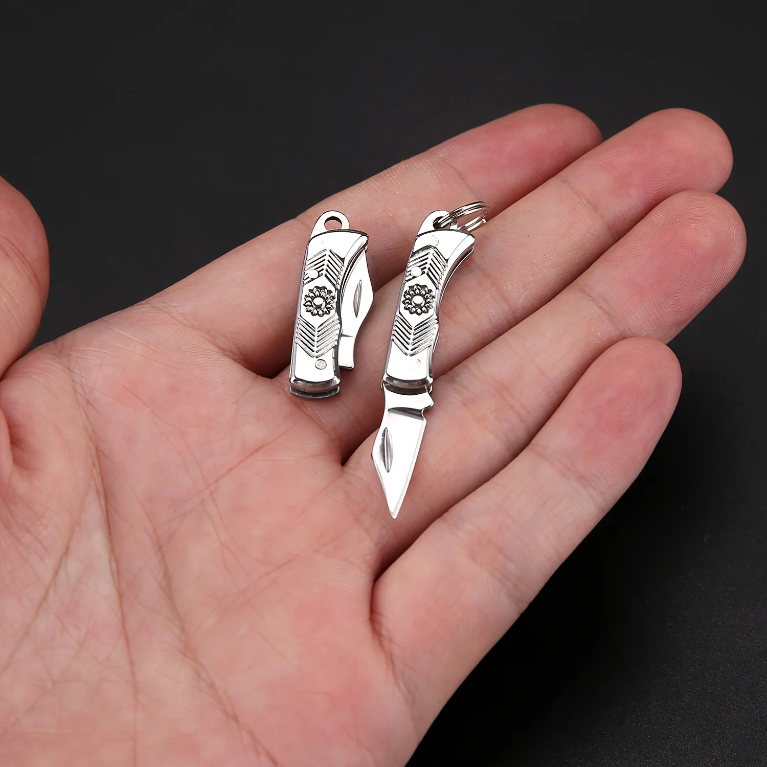 Portable compact folding pocket knife with stainless steel blade, keychain attachment, lightweight and durable