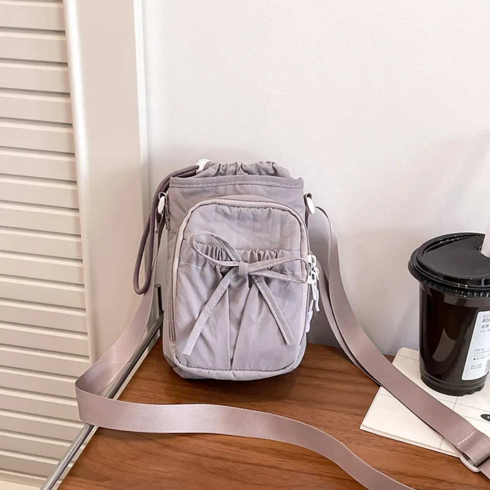 

Fashion Bow Water Bottle Bag Drawstring Solid Color Phone Crossbody Bag Minimalist Nylon Water Cup Bag Girl