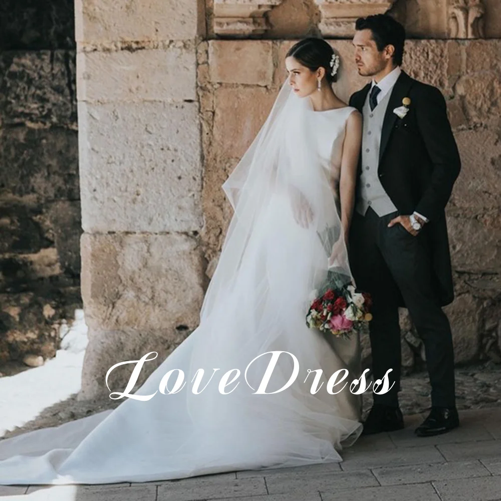 Lovedress boho o-pescoço sem mangas vestido de casamento com bolsos a linha simples cetim vestido de noiva sem costas tribunal trem personalizado