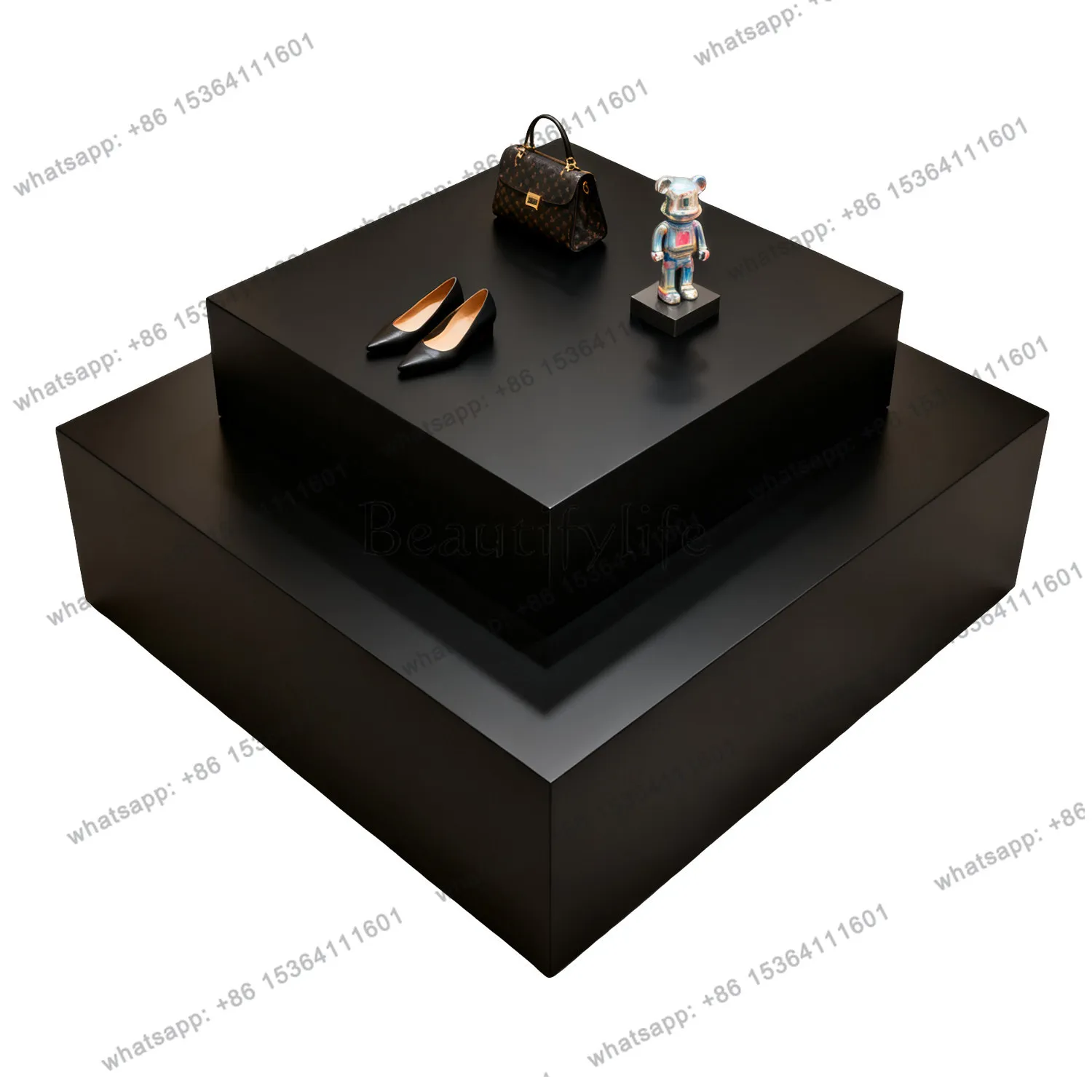 Wooden Nakajima table in the middle of the clothing store display rack