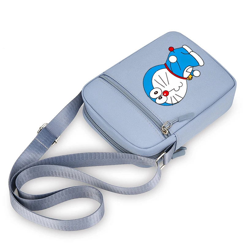 Bolso de hombro para niña y niño de Doraemon, Mini bolso Oxford para teléfono móvil, bolso cruzado de dibujos animados de Anime, riñonera Kawaii para mujer, regalo de cumpleaños