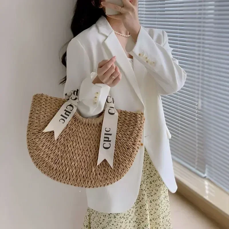 

2024 Design Holiday Style Letter Ribbon Handheld Bag For Women Grass Woven Tote New Knitted Bag For Beach Vacation Crossbody Bag