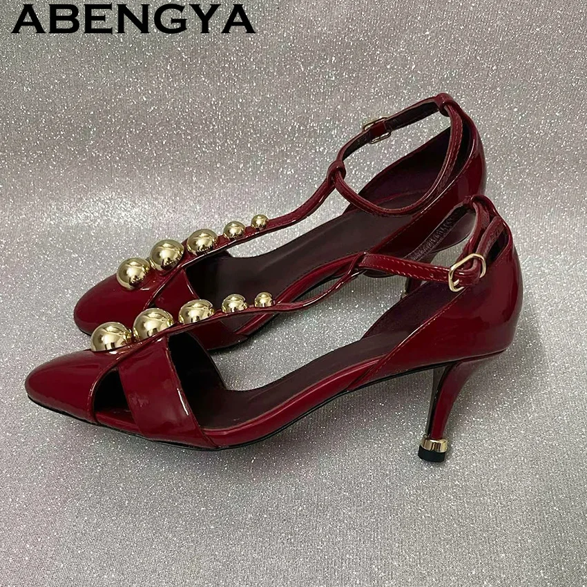 Trendy Gold Button T-strap Buckle Stiletto Sandals Woman Round Toe Hollow Mid Heels Sandals Women 2026 Summer Sexy Flat Sandals