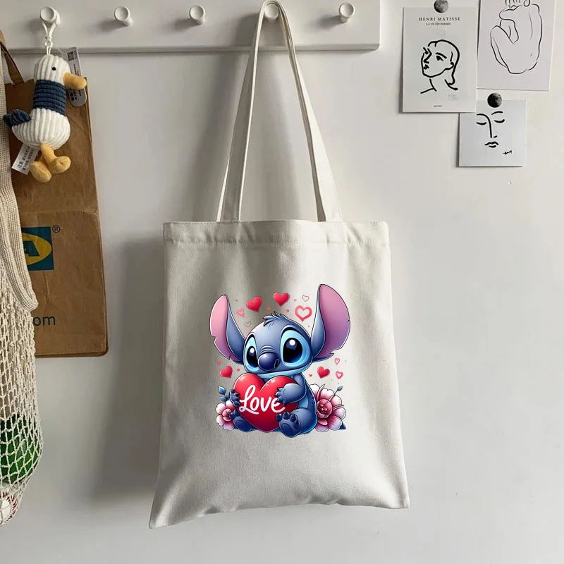 การ์ตูน Disney Stitch กระเป๋าถือผู้หญิง Casual Totes Underarm Top Handle กระเป๋า Lady ช้อปปิ้งกระเป๋าเดินทางผ้า/ผ้า/ผ้า/ผ้า/ผ้า/ผ้า/ผ้า/ผ้า/ผ้า/ผ้า/ผ้ากระเป๋าไหล่กระเป๋า