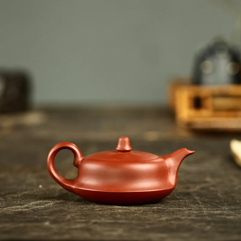 

Authentic Yixing Purple Clay Pot Raw Mine High Quality Dahongpao Ball Hole Curved Pot Tea Set Kung Fu Tea Pot Gift 150cc