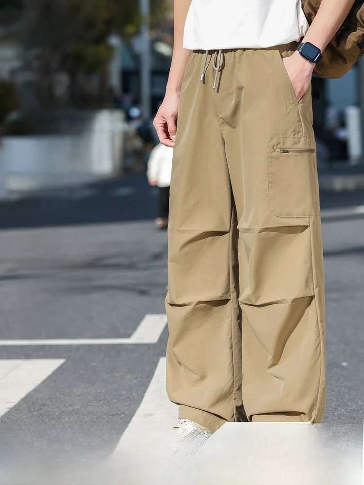 

Snow Flying 2026 Spring Men's Outdoor Casual Trousers Lightweight Waterproof Workwear Sports Polyester Fiber Straight Leg Pants