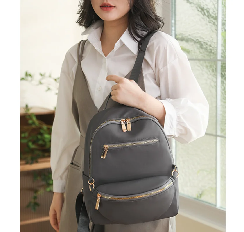 

2026 New Women's High Quality Waterproof Nylon Travel Backpack Large Capacity Laptop School Bag Ladies Casual Shoulder Bags